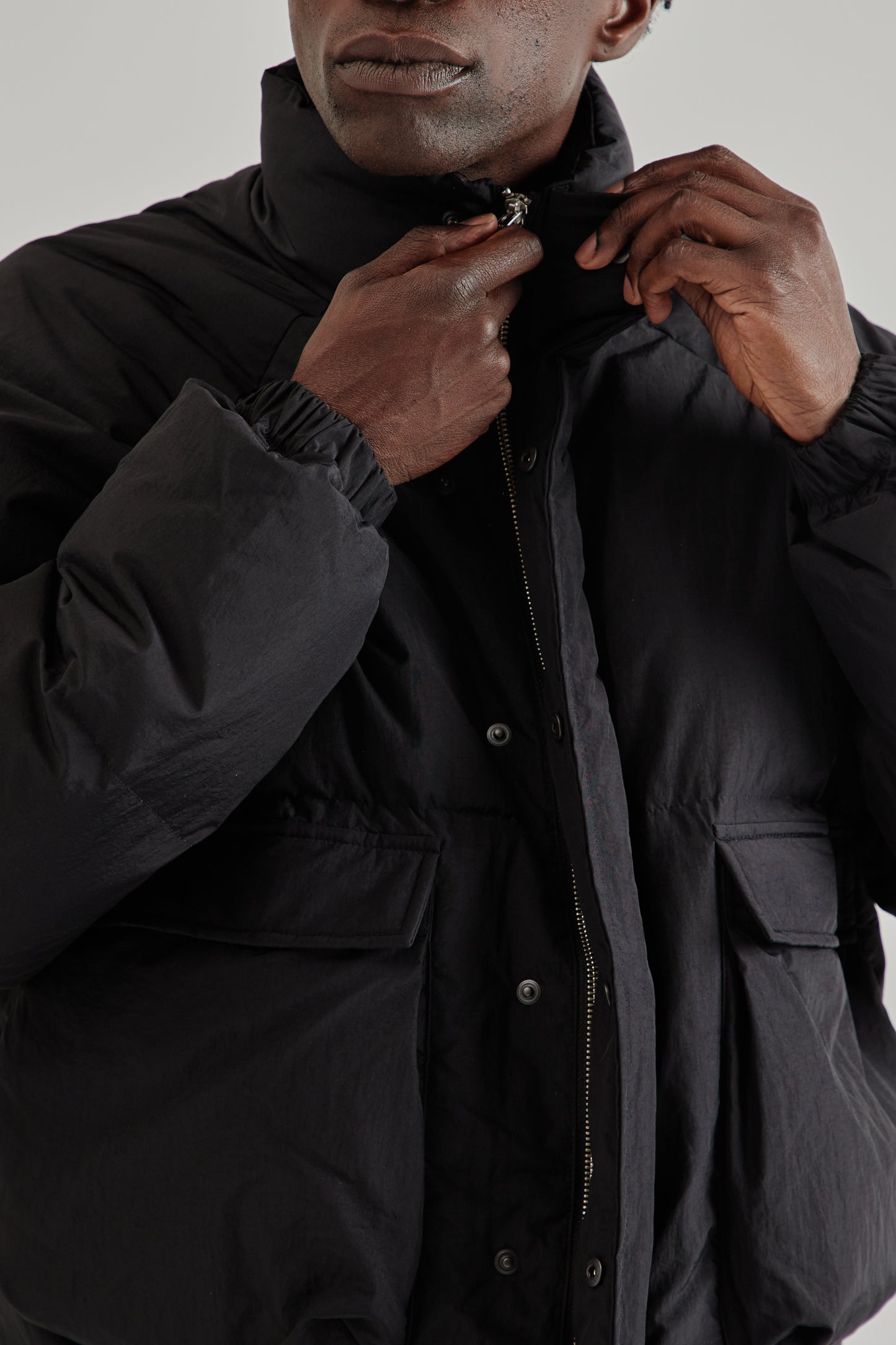Estudio Niksen FW25 Raglan Puffer Jacket Black11