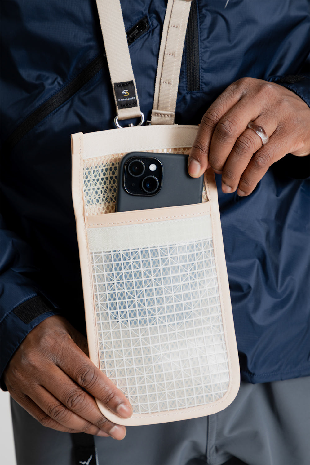 Master-Piece lattice phone case in beige.