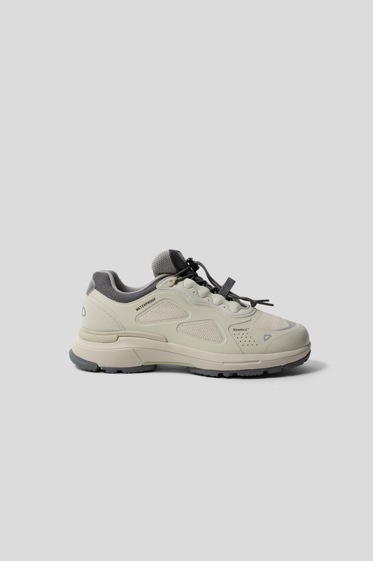 Athletics FTWR One 2 Waterstop Low in silver and green.