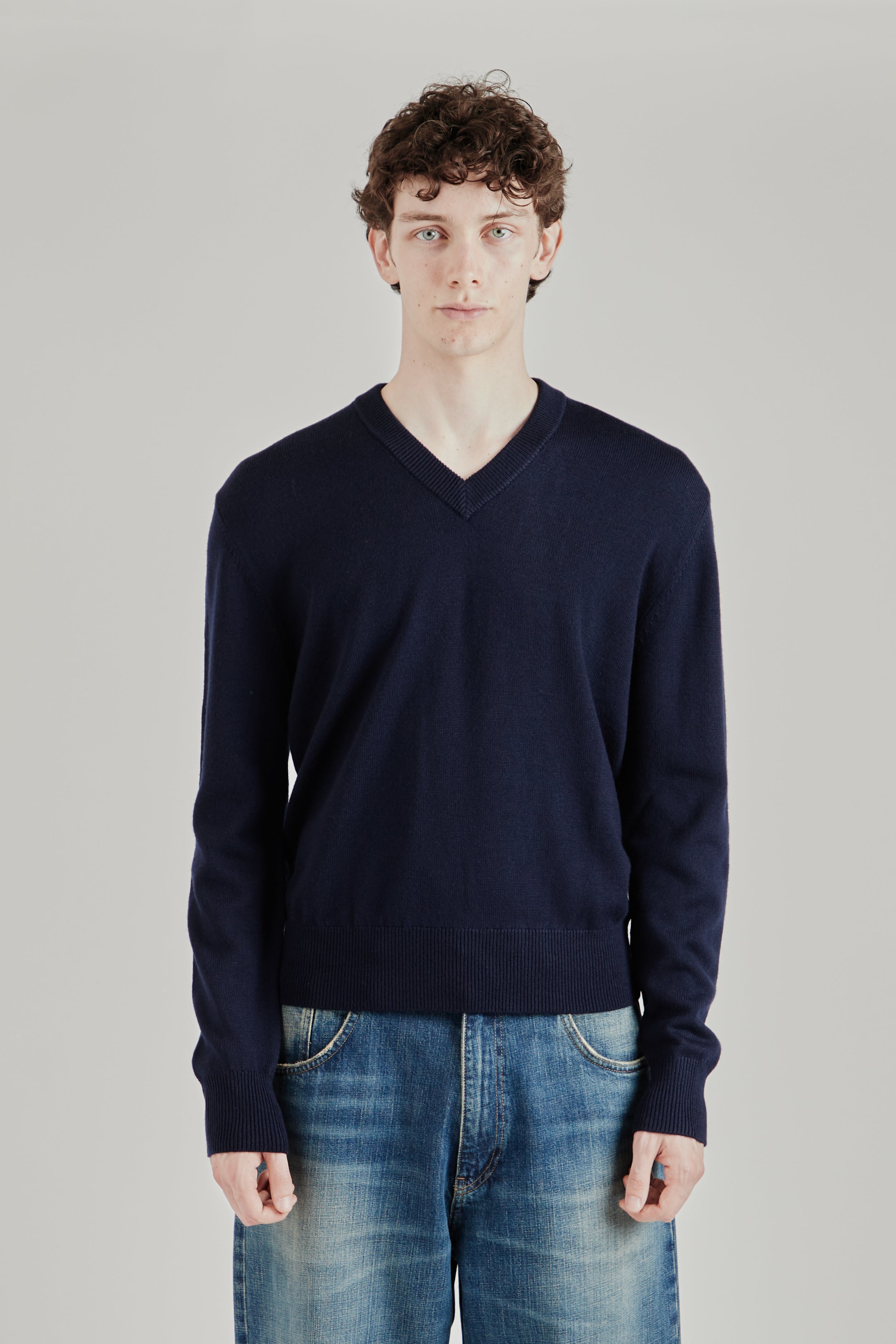 Shop the Sunflower Moon Merino V Neck Sweater for FW26. Available