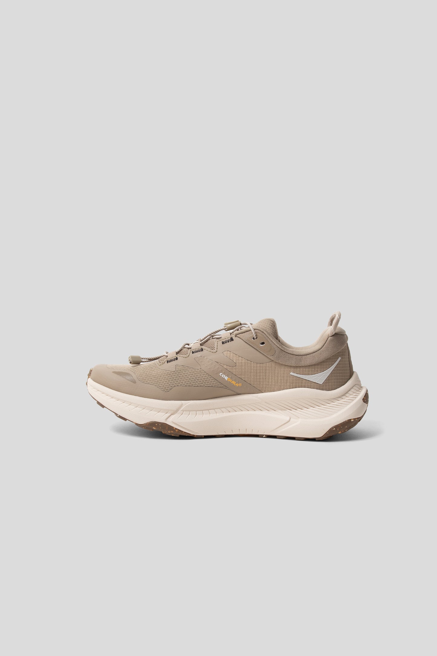 Hoka's Transport GTX sneaker in the Dune/Eggnog colourway.