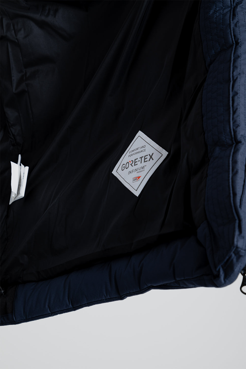 Goldwin Gore-Tex Infinium Fly Air Down Parka in Ink Navy