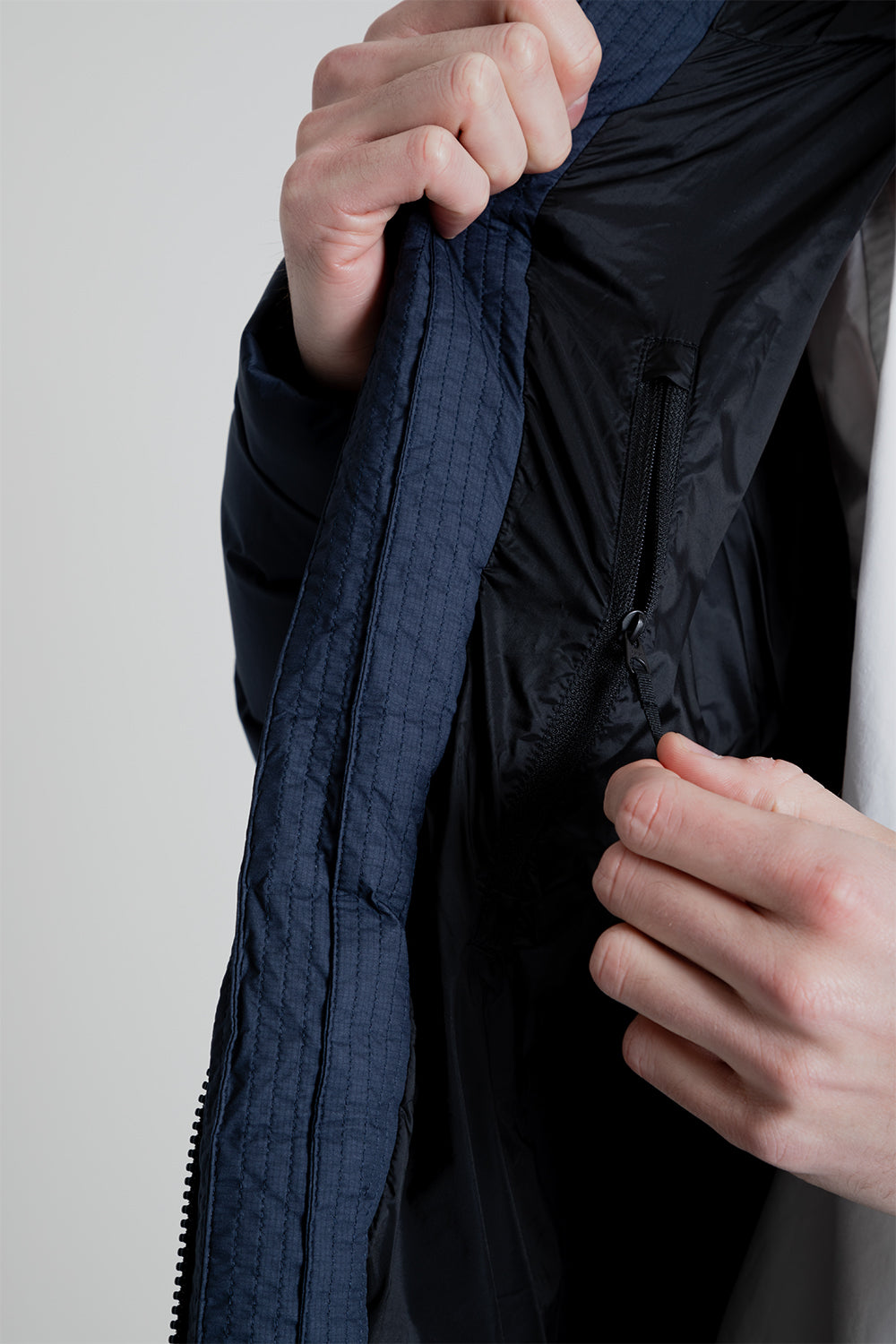 Goldwin Gore-Tex Infinium Fly Air Down Parka in Ink Navy