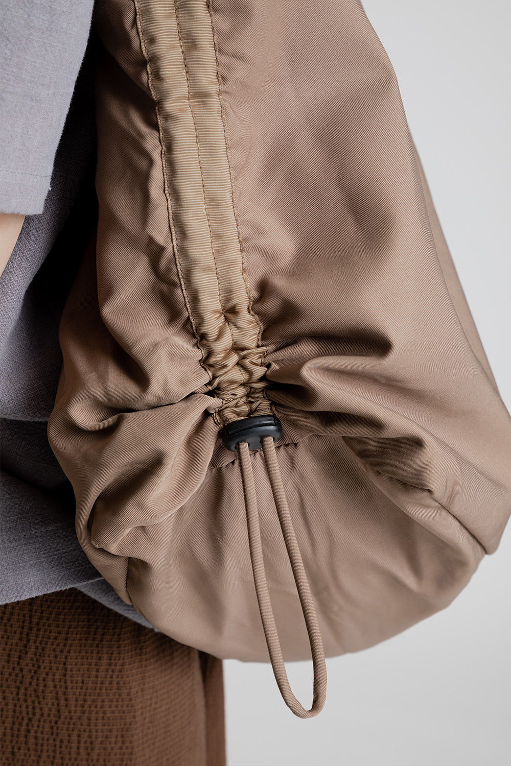 Arcs Hey Sling Bag in Cub
