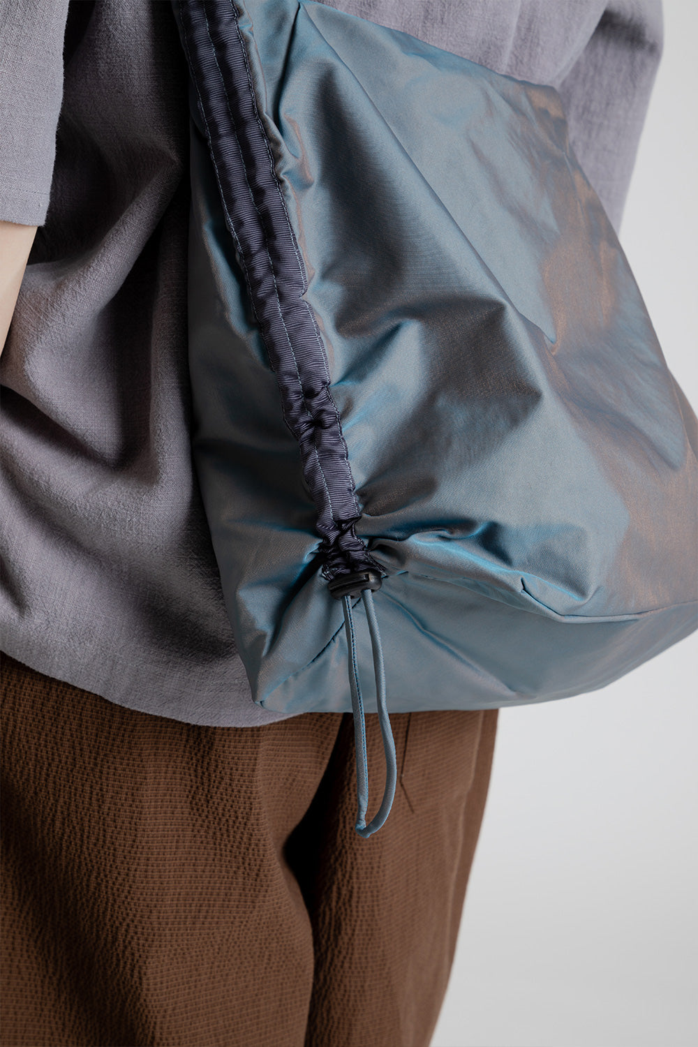 Arcs Sling Bag in Sea