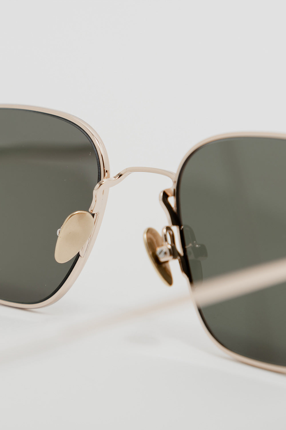 monokel-eyewear-otis-gold-green-gradient-lens