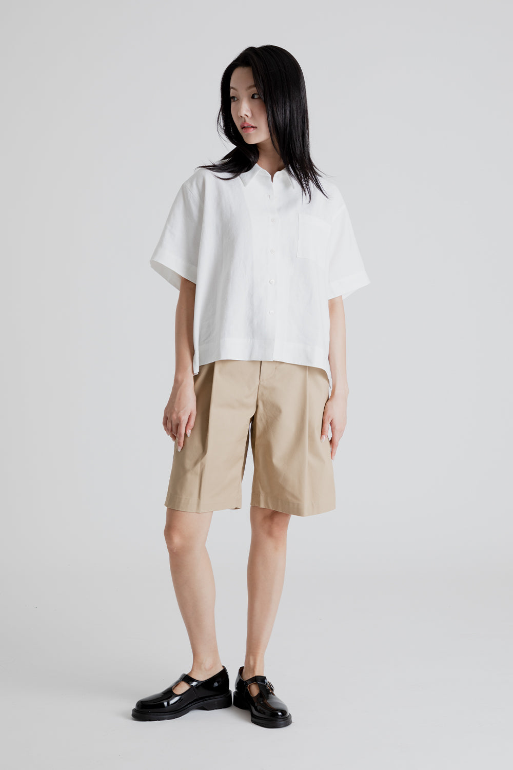 Uniform Bridge Women's One Tuck Half Chino Pants in Beige