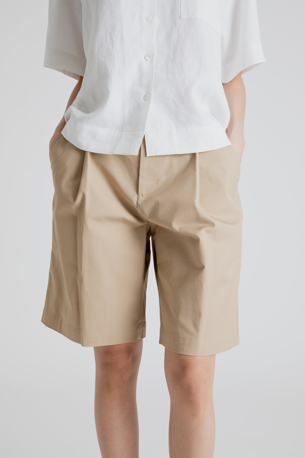 Uniform Bridge Women's One Tuck Half Chino Pants in Beige