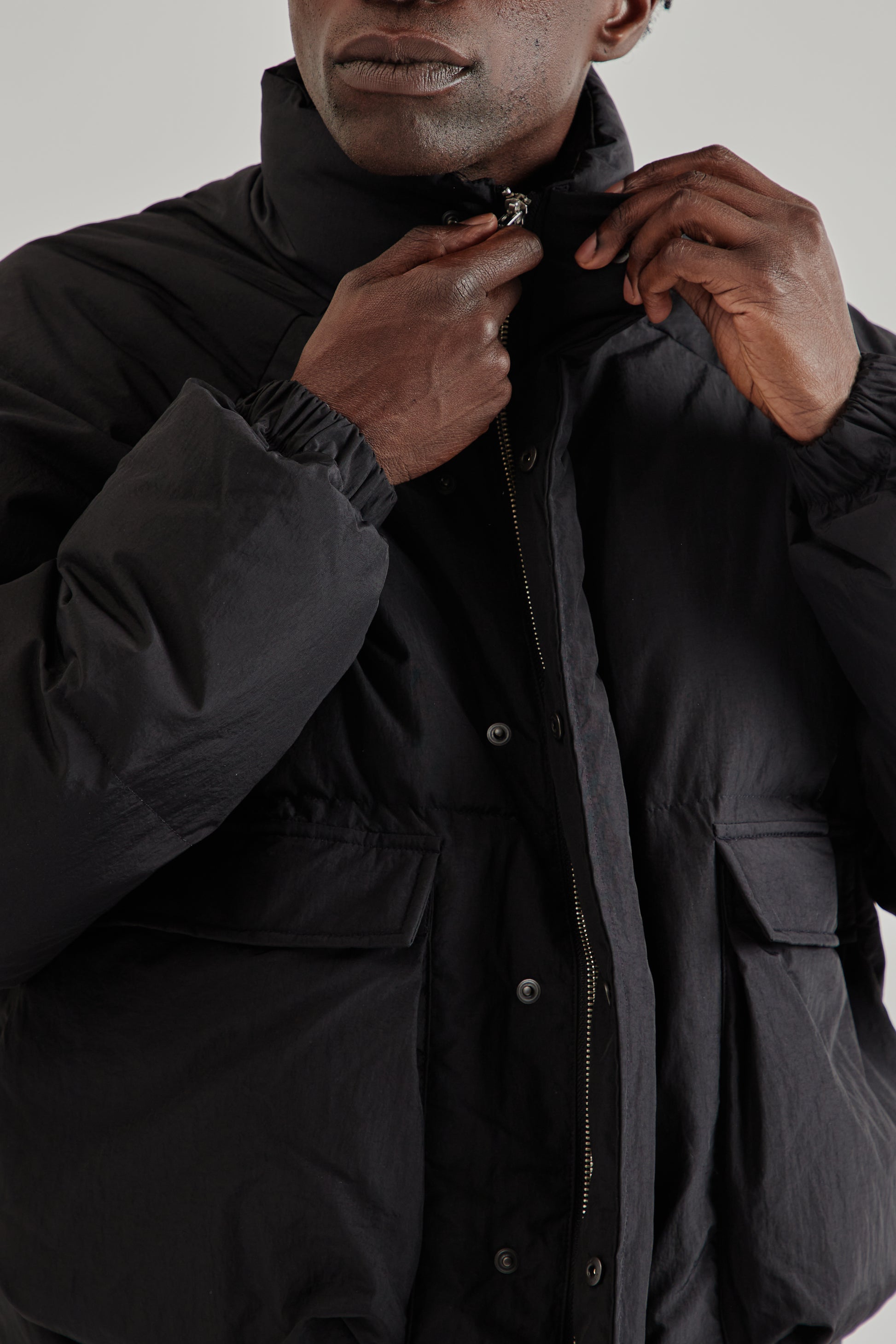 Estudio Niksen FW25 Raglan Puffer Jacket Black11