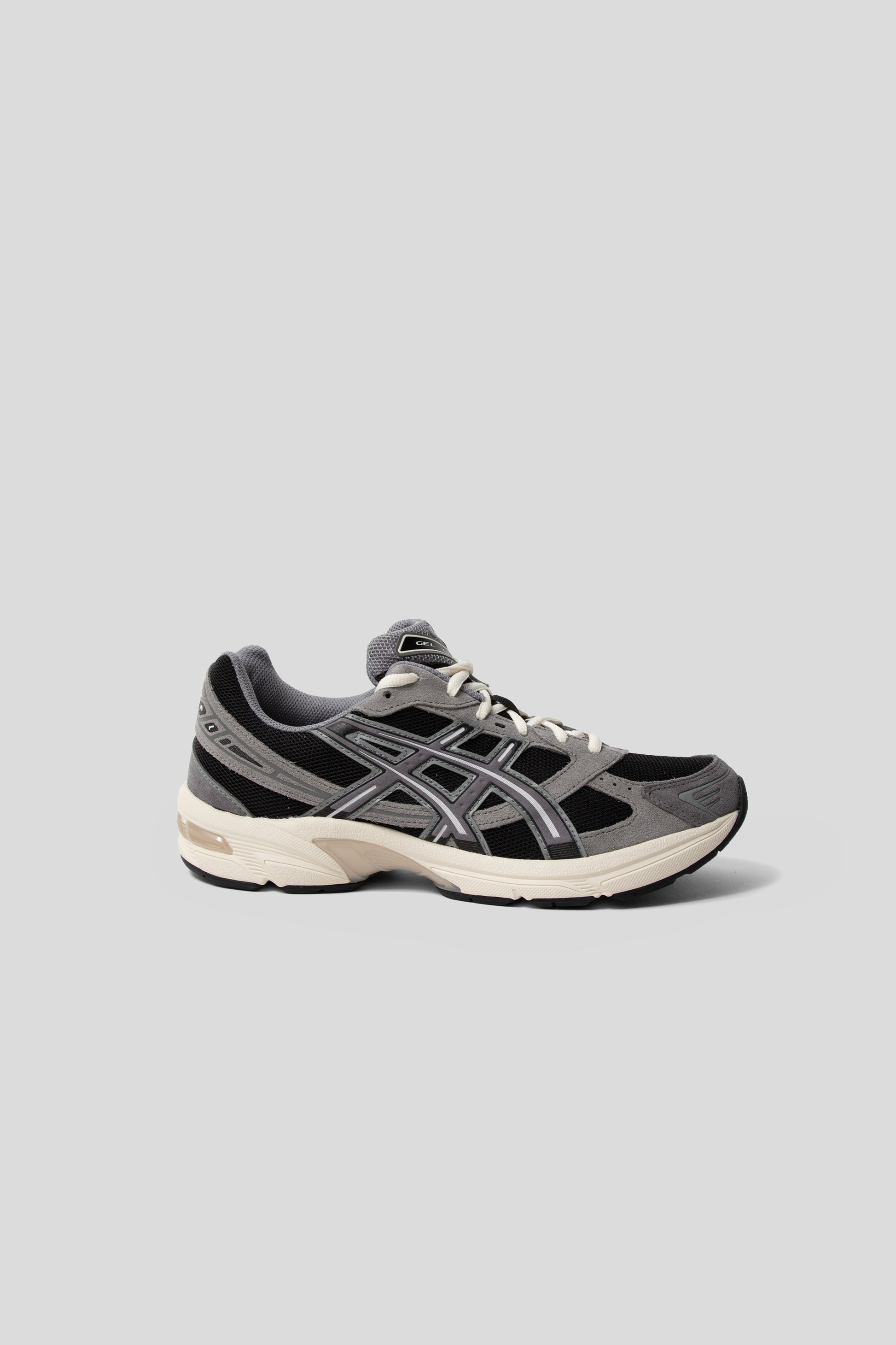 Asics Gel-1130 sneakers in Black and Carbon