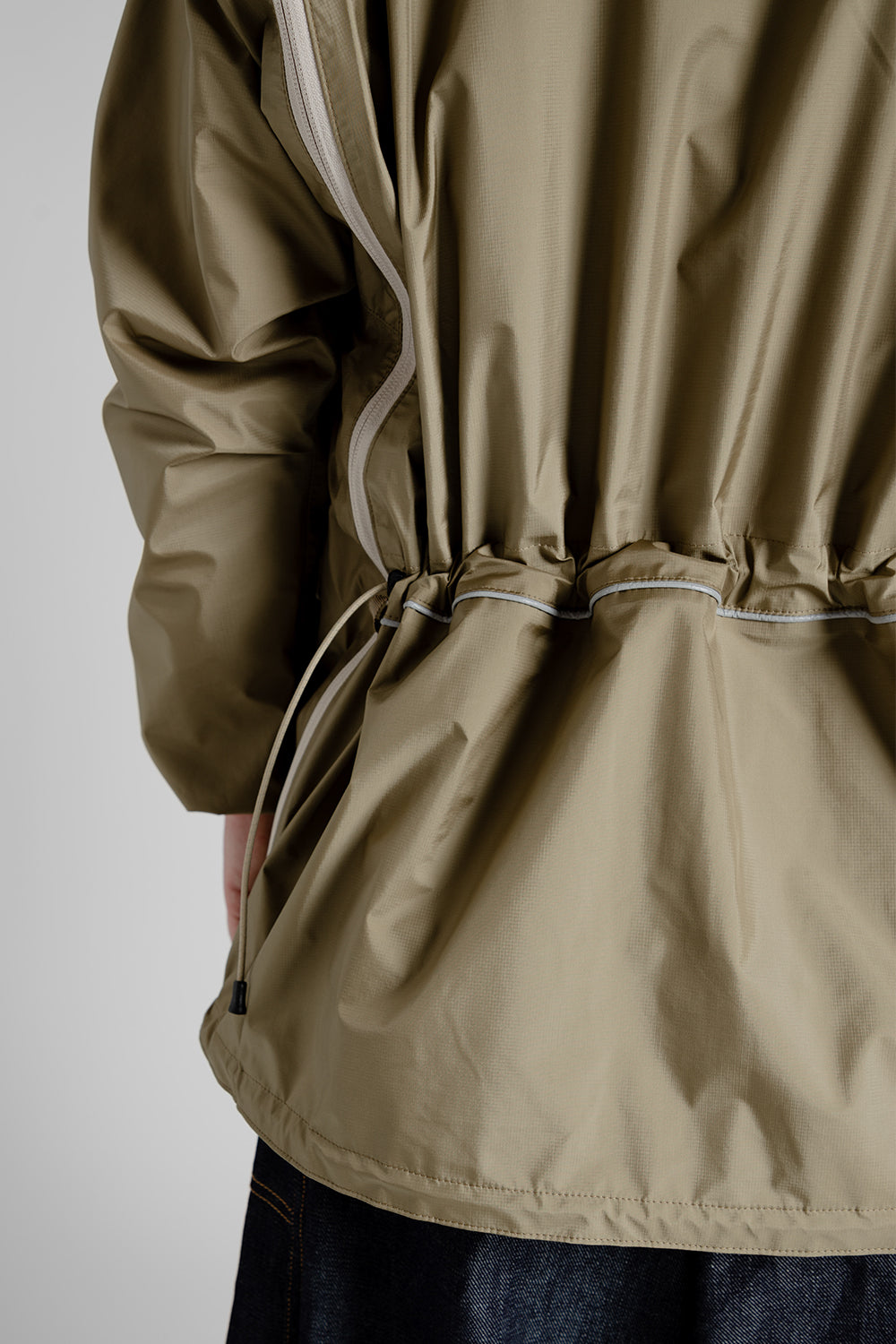 Is-Ness 3Layer Transformable Jacket in Beige.