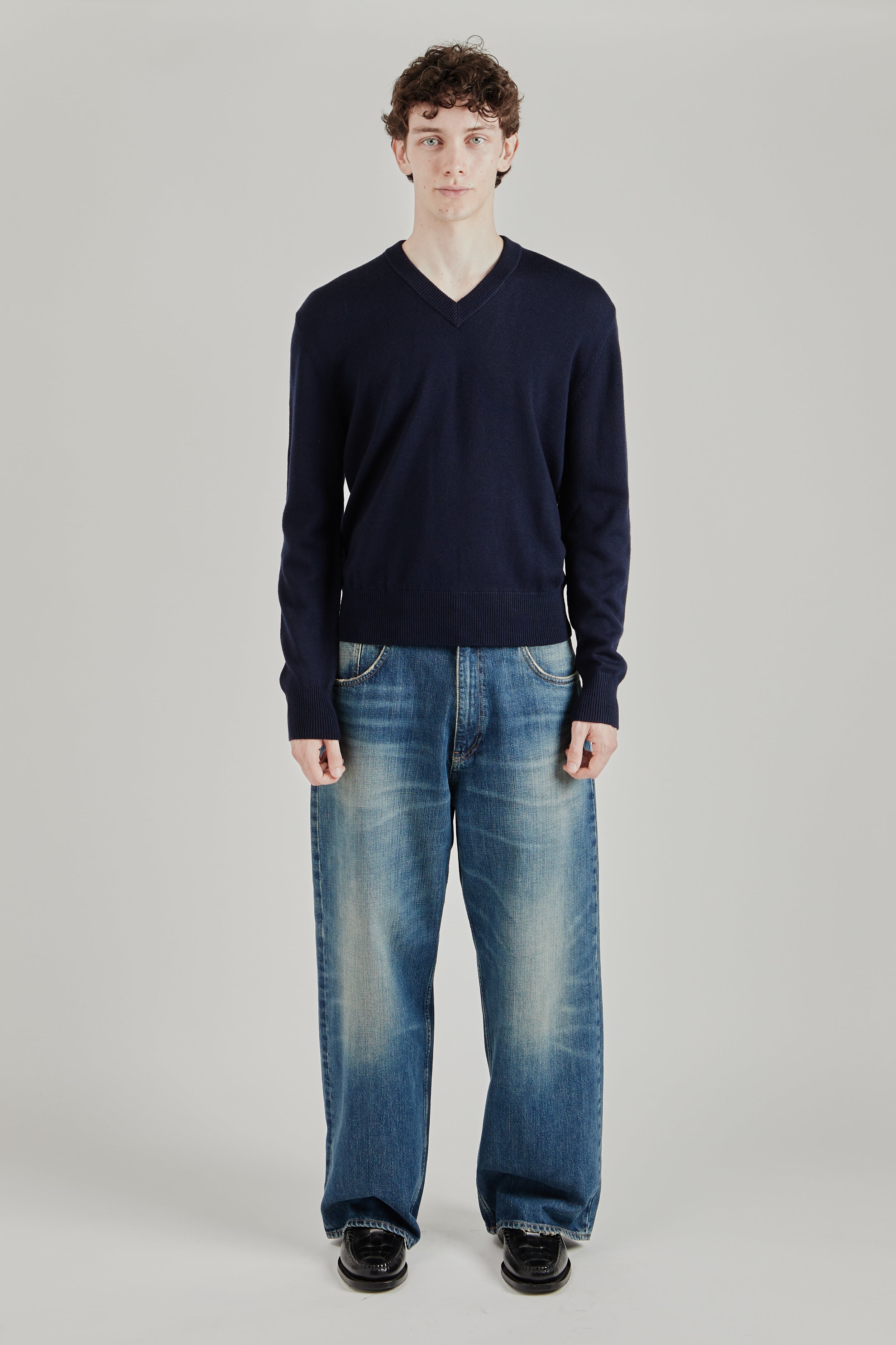 Shop the Sunflower Moon Merino V Neck Sweater for FW26. Available