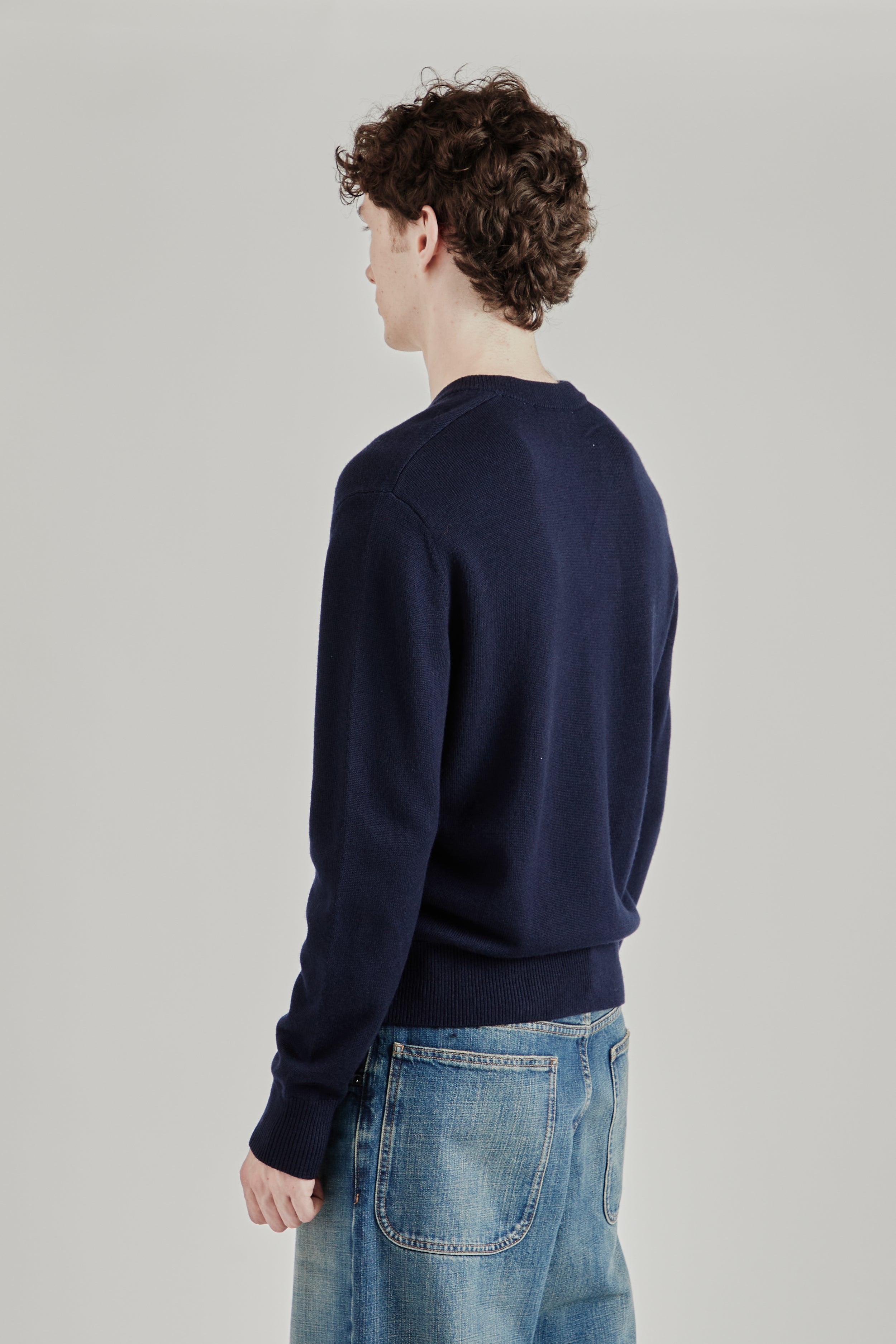 Shop the Sunflower Moon Merino V Neck Sweater for FW26. Available