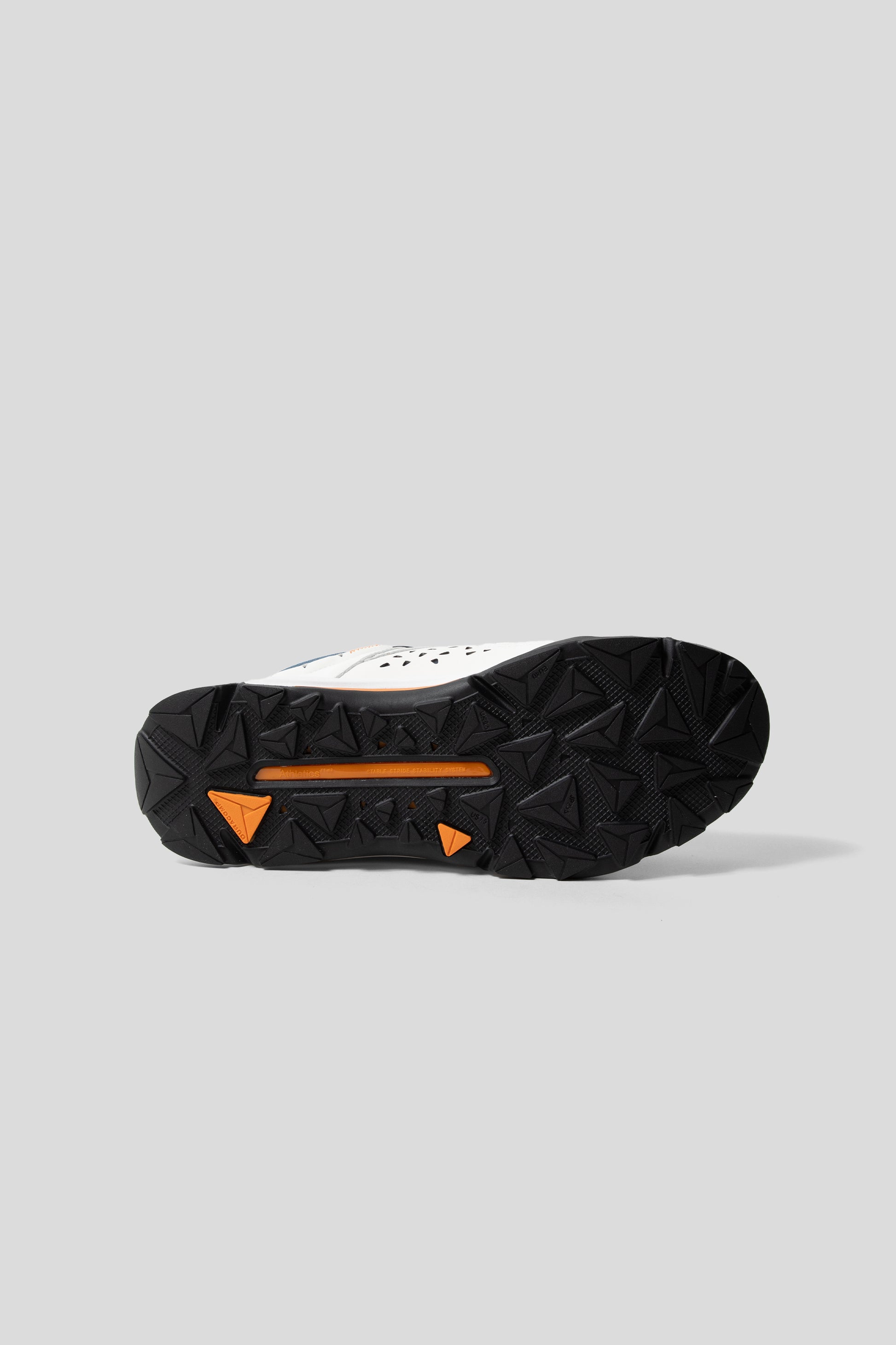 Athletics FTWR VTWO MID in the Cloud White and Orange Pepper colourway.