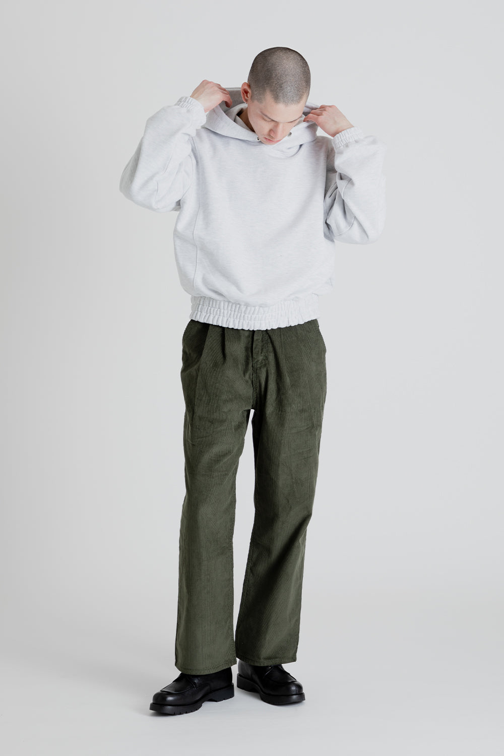 https://wallacemercantileshop.com/cdn/shop/products/Frizmworks_Corduroy_Comfort_Two_Tuck_Pants_Olive_Front.jpg?v=1667348581