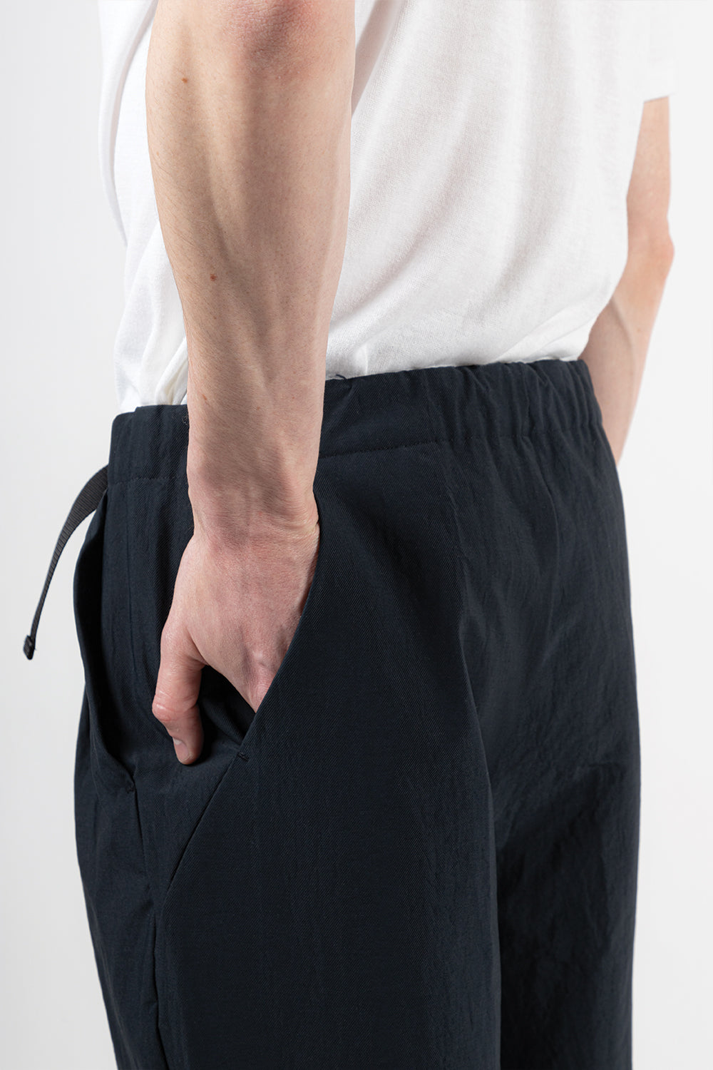 Goldwin One Tuck Tapered Stretch Twill Pants in Dark Navy