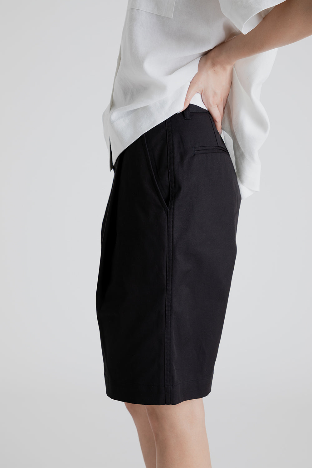 Uniform Bridge Women's One Tuck Half Chino Pants in Black